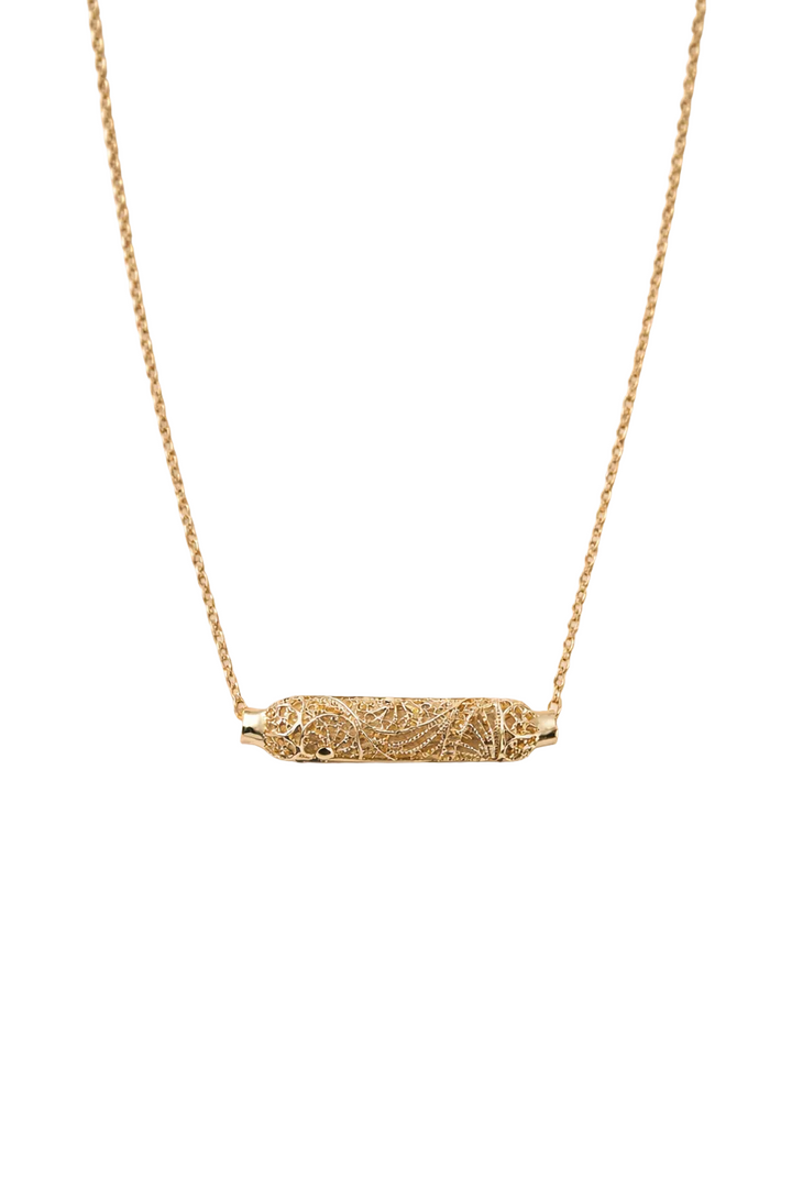 Aurelia Filigree Necklace lifestyle shot showing filigree pendant on neck