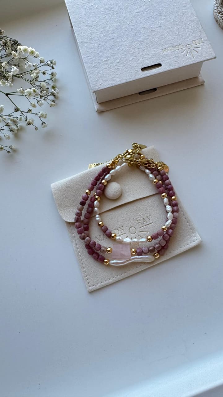 BARCELET MR 17 lifestyle detail showing stone and gold bead bracelet